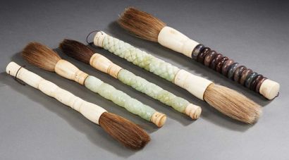 CHINE - XXe siècle Set including five brushes in celadon nephrite, bone and hard...