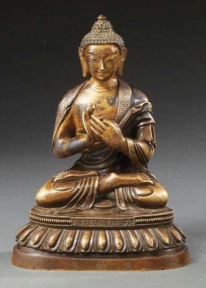 CHINE - XXe siècle Statuette de Vairocana en bronze partiellement laqué or, assis...