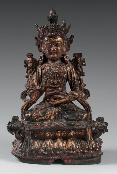 CHINE - Epoque MING (1368-1644) Statuette de Guanyin en bronze laqué or, assise en...