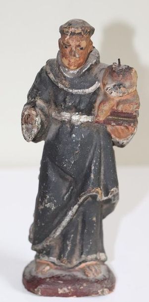 null Saint Joseph en bois sculpté et polychrome.

XVIIIème siècle.

H_ 15.1cm, m...