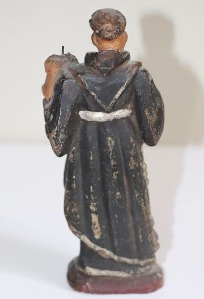 null Saint Joseph en bois sculpté et polychrome.

XVIIIème siècle.

H_ 15.1cm, m...