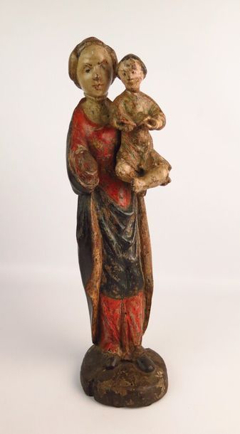 null Sainte Anne et la Vierge.

Groupe en bois sculpté polychrome.

XVIIIème siècle.

H_45,5...