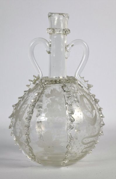 null HOLLAND.

Bottle with two handles in blown and engraved glass of mill, boat,...