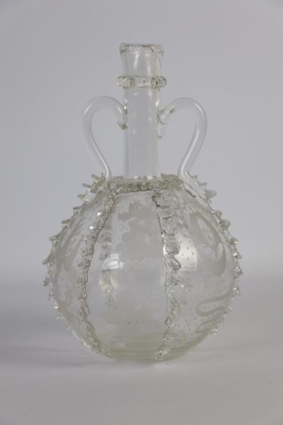 null HOLLAND.

Bottle with two handles in blown and engraved glass of mill, boat,...