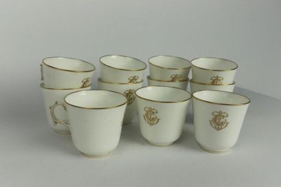 null SEVRES.

Tea and coffee service part made of white and gold porcelain, triple...
