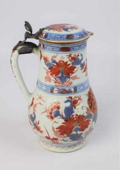 null CHINA.

Water jug and its basin in porcelain with Imari decoration.

18th century.

The...