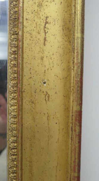null Miroir en bois et stuc doré.

Début du XIXème siècle.

H_114 cm L_97 cm, la...