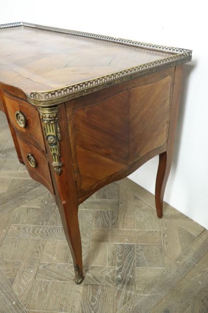 null Veneer marquetry desk opening with four drawers, two rows on each side and one...