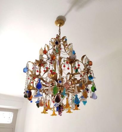 null MURANO, Venice.

Pair of six-light "tutti frutti" chandeliers, richly ornamented...