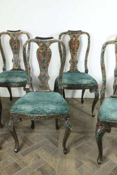 null Suite of six chairs in lacquered wood with polychrome flower decoration.

Venetian...