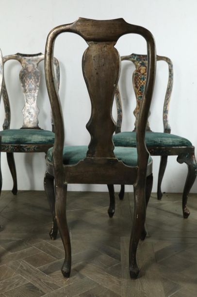 null Suite of six chairs in lacquered wood with polychrome flower decoration.

Venetian...