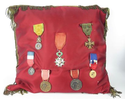 null Cushion with bronze canetilles quilted with seven decorations, including a medal...