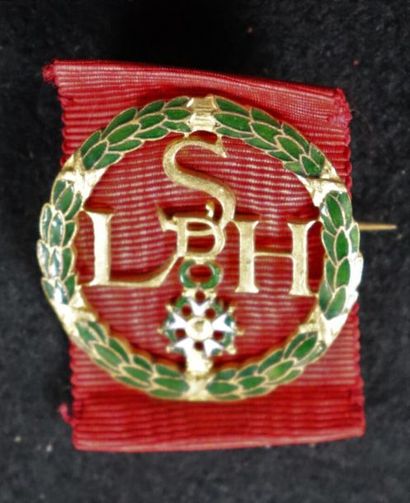 null Set of three decorations and a Legion Honour Society insignia:

A silver military...