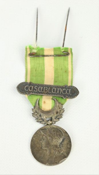 null Set of military decorations comprising :

a commemorative medal of Morocco,...
