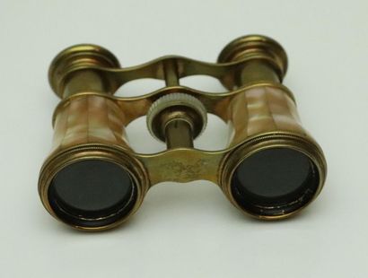 null Pair of theatre binoculars made of brass and mother-of-pearl plates.

Napoleon...