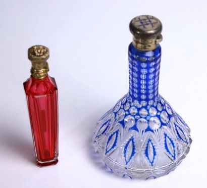 null Two colored crystal salt and perfume bottles.

The most important cut with geometrical...