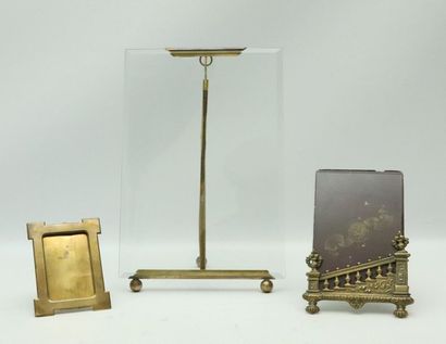 Set of three picture frames, one of which...