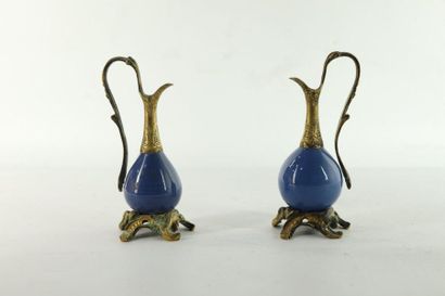 null Pair of Chinese porcelain vases, blue background.

Napoleon III period bronze...