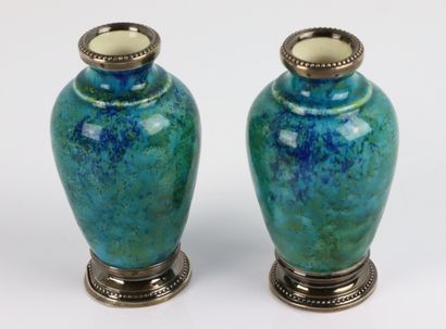 null Paul MILET à Sèvres.

Paire de vases en faïence à décor nuancé bleu-vert, les...