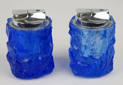 null DAUM France.

Deux briquets de table en cristal bleu, un briquet de table, modèle...