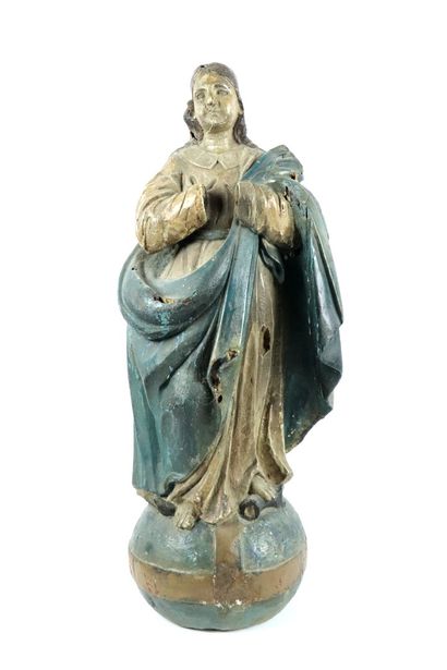 null Vierge miraculeuse en bois sculpté et polychrome.

La Sainte est représentée...