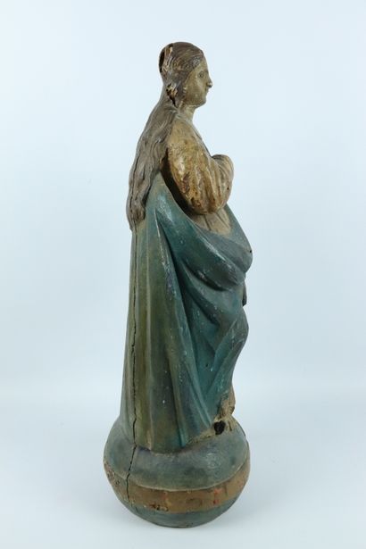 null Vierge miraculeuse en bois sculpté et polychrome.

La Sainte est représentée...