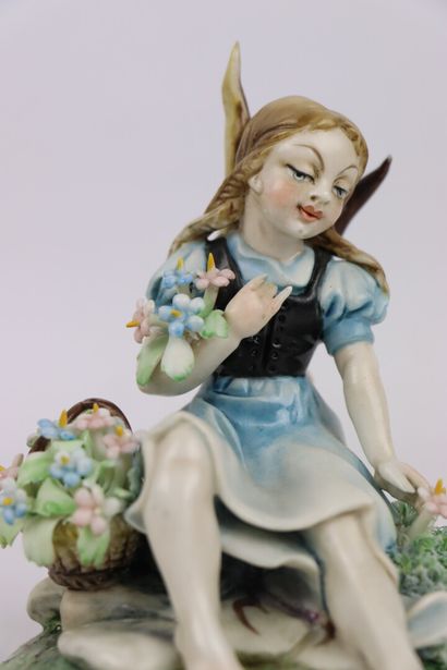 null CAPODIMONTE.

Statuette en porcelaine figurant un personnage de conte de fée.

H_12,5...