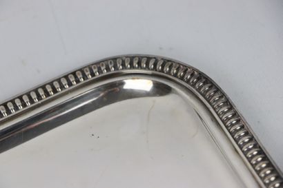 null Plateau à anses en métal argenté, le pourtour à godrons.

L_61,5 cm