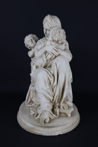 null RAPHAEL (1483-1520), d'après.

La Vierge à la chaise.

Groupe en plâtre patiné.

Etiquette...