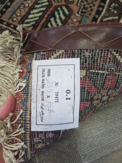 null IRAN, Djahad.

Tapis en laine à décor de jardin.

L_235 cm l_157 cm