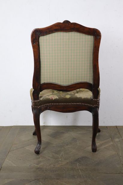 null Chaise en bois mouluré et sculpté.

Epoque Louis XV.

Garniture de tapisserie...