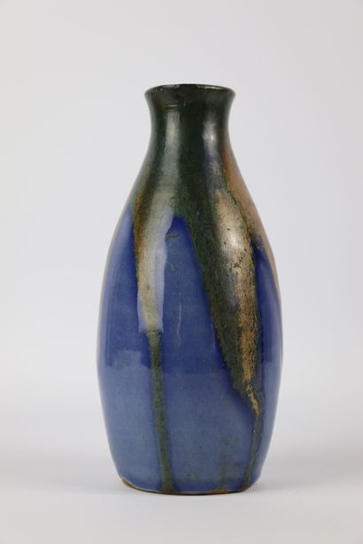 null Léon POINTU (1879-1942).

Vase ovoïde à col évasé en grès, à coulures marron...