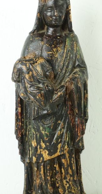 null Vierge à l'enfant en bois sculpté polychrome. 

Epoque XVIIème siècle. 

H_42...