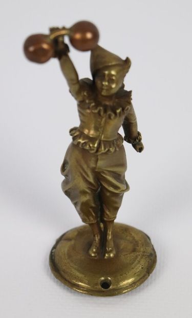 null Statuette en bronze et cuivre représentant un jongleur avec une haltère. 

H_10,5...
