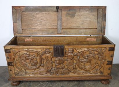 null Carved walnut chest decorated with tritons and dragons.

Partly from the XVIIth...