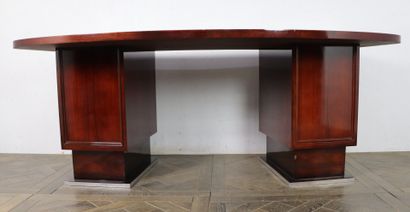 null Stained and varnished wood bureau with a slightly kidney shape, angular.

It...