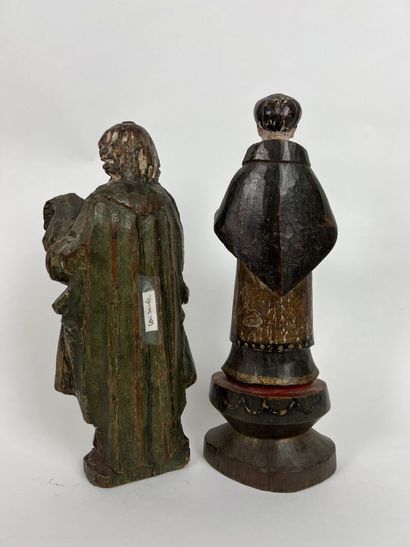 null Deux sculptures en bois polychromes.

XVIIIe et début du XIXe siècle. 

H_28...