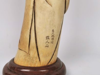 null CHINA, in the Ming style.

Statuette of a wise man in carved ivory, holding...