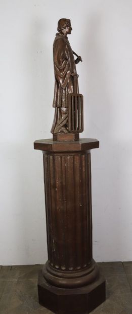 null Statue en fonte figurant Saint Laurent et son grill, reposant sur une colonne...