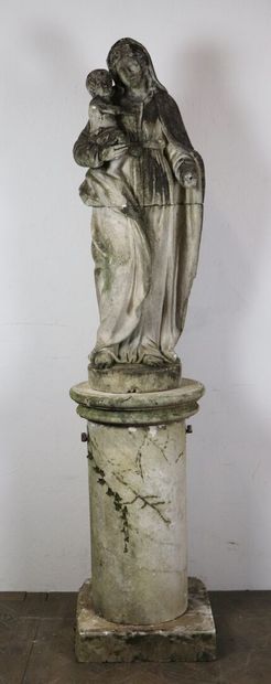 null Virgin and child in carved stone, on a column forming a pedestal. 

19th century.

H(virgin)_109...