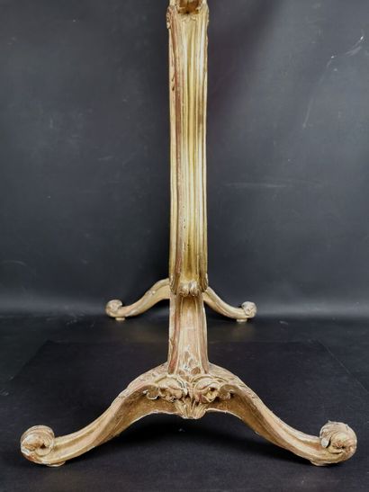 null A molded, carved and gilded wood fire screen decorated with flowering branches,...