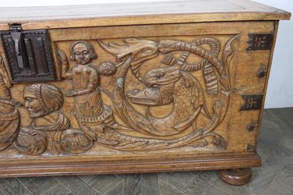 null Carved walnut chest decorated with tritons and dragons.

Partly from the XVIIth...