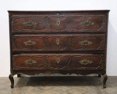 null Moulded and carved oak chest of drawers opening to three drawers on three rows....