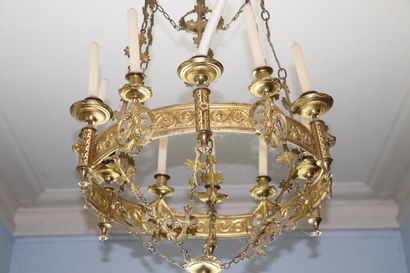 null Important church chandelier with twelve lights in brass and gilt metal.

End...
