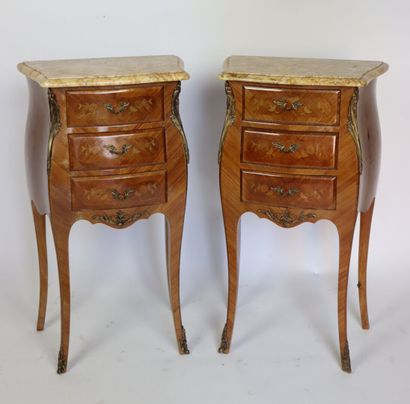 null Pair of bedside tables in rosewood veneer, marble tops, opening with three drawers....