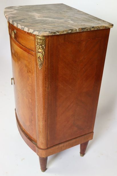 null Bedside table opening to a door and a drawer, gilt bronze ornamentation and...