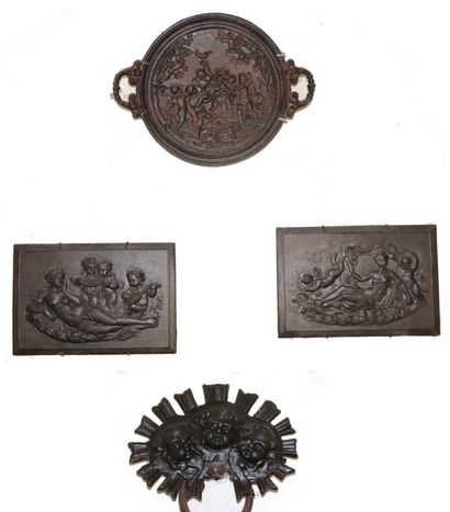 null Set in cast iron including :

two plates showing Venus and loves, a cup with...