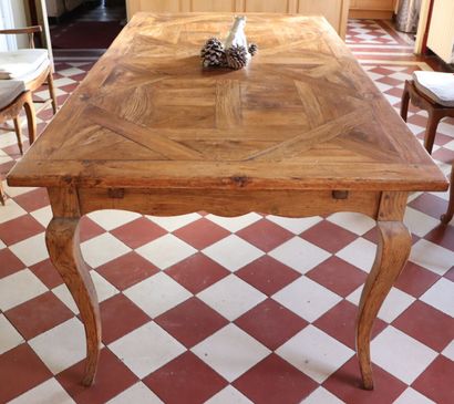 null Dining room table in oak, the top made of Versailles parquet slabs.

Composed...