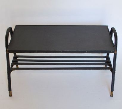 null Jacques ADNET (1900-1984), attributed to.

Coffee table in black saddle-stitched...