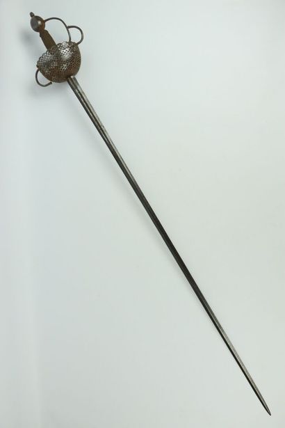null Epée à coquille ajourée en fer forgé.

L_126,5 cm